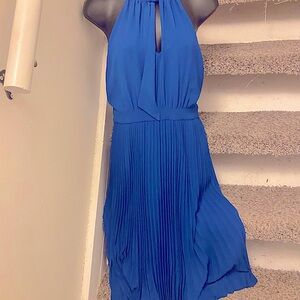 Maggy London Royal Blue Dress. Halter style neck with tie.Slimming waist. Size 2